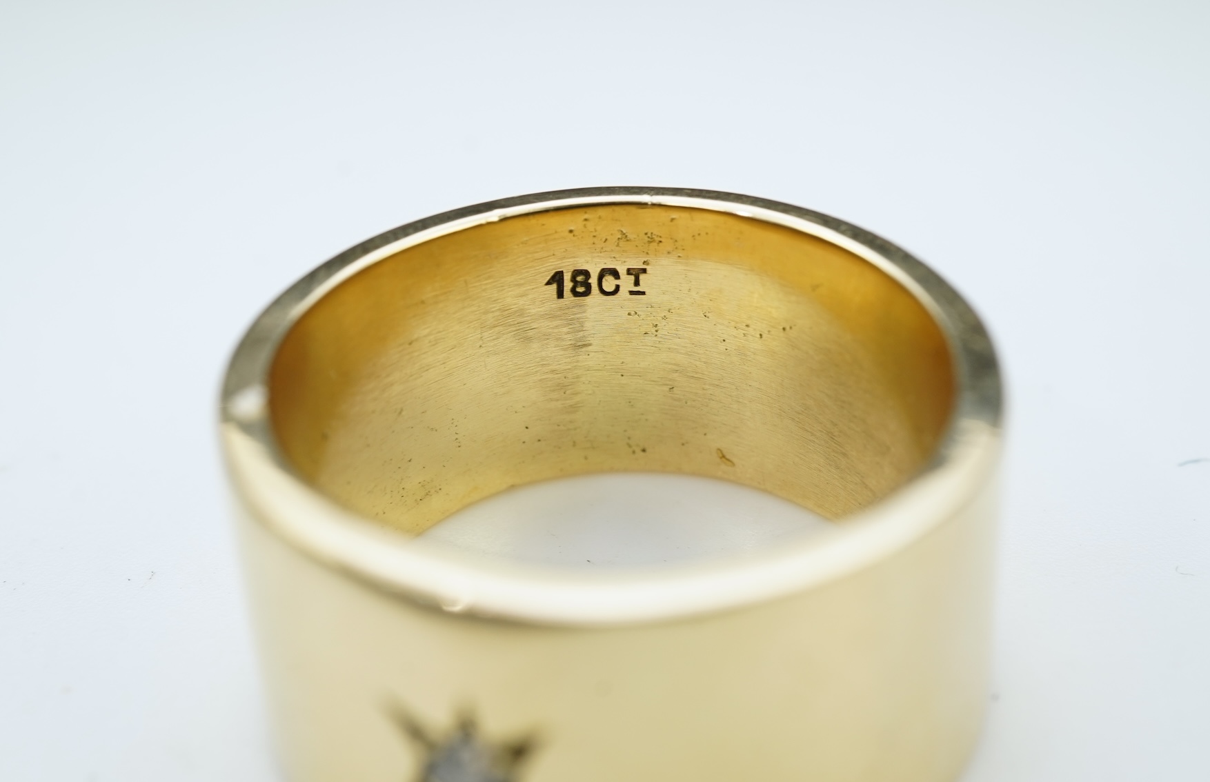 A gold and diamond ring